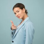 Woman Wearing Blue Shawl Lapel Suit Jacket